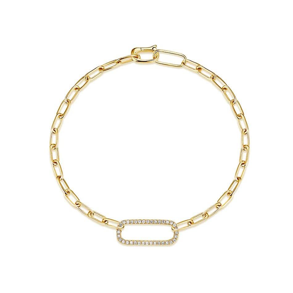 yellow gold oval link chain bracelet with a larger diamond link in the center